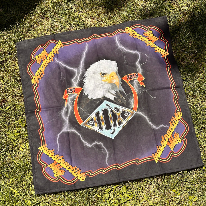 Bandana with an eagle design on a grassy background